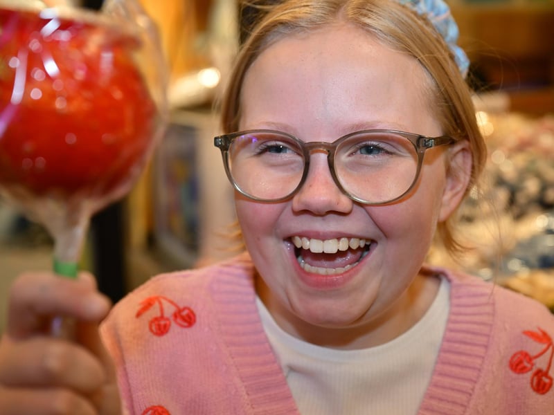 Enjoying a toffee apple treat