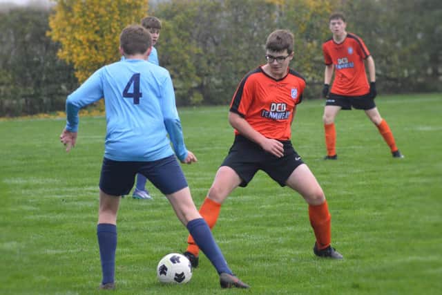 Heslerton Under-16s in action against Stamford Bridge (bluie kit)