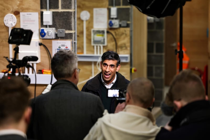 Rishi Sunak speaks to members of the press during his visit. Picture by Darren Staples-WPA Pool/Getty Images.