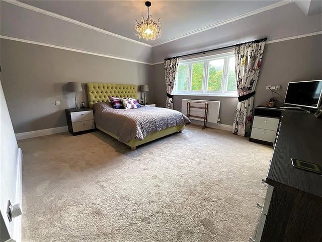 The house has three double bedrooms and three bathrooms, with a further bedroom available.