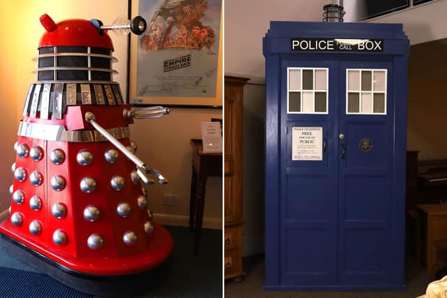 Dalek Protection - Viper guards the saleroom entrance; the TARDIS amid antique furniture.