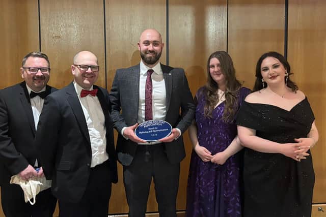 Scarborough's Central Tramway Company team with her heritage award.