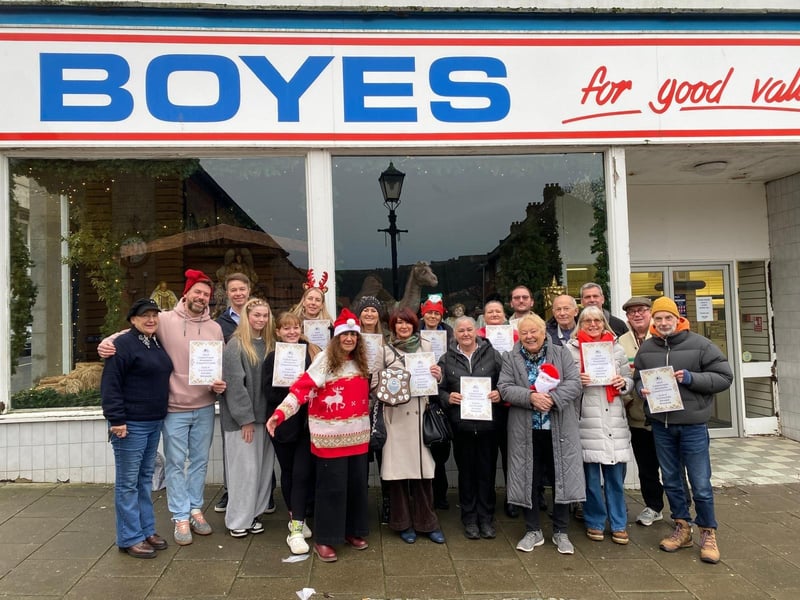 All of the competition winners gathered in front of Boyes department store.