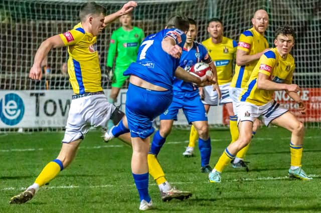Midfielder Lewis Hawkins takes up one-year option with Whitby Town