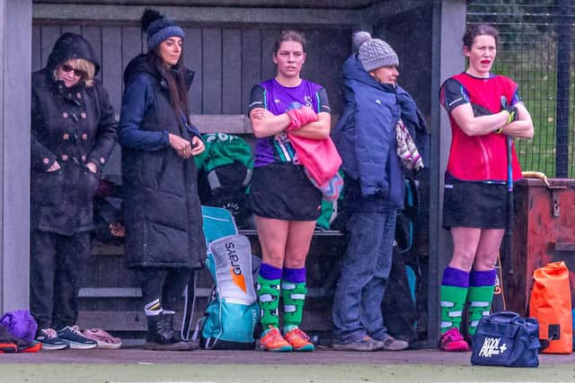 Danby players watch from the dug-out.