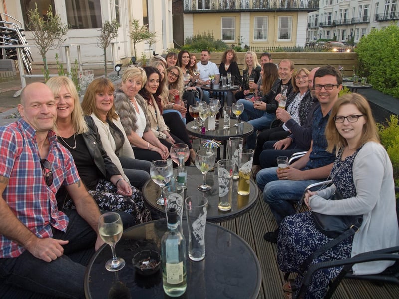 Cross Hill work colleagues help Kath celebrate her birthday on the terrace of the Ink Bar.