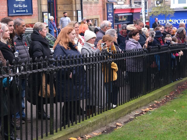 A crowd of people gathered to watch the service