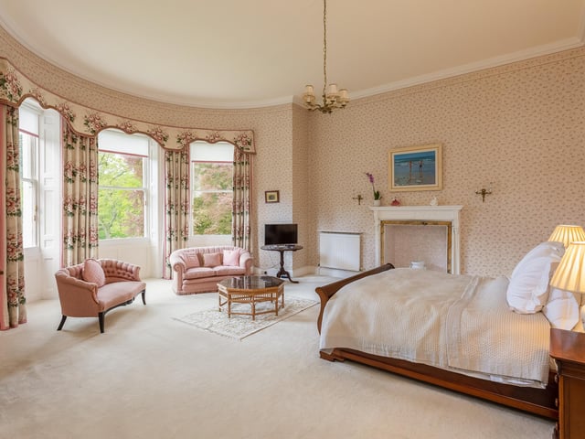Fireplaces and period decorative features are to be seen in bedrooms within the property.