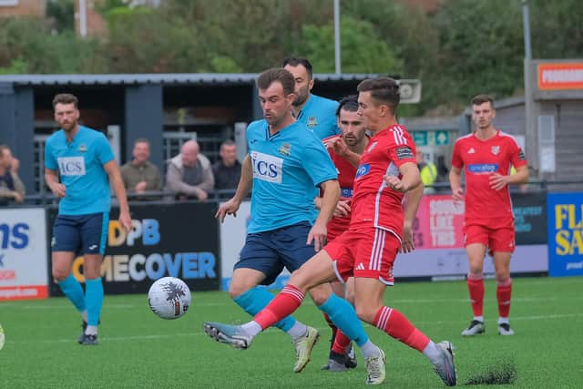 Boro's Lewis Maloney takes on former Boro teammate Ryan Watson.