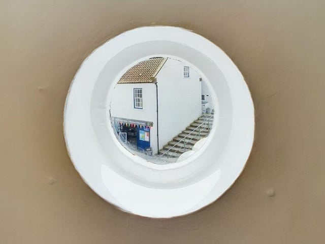 Porthole windows are a feature of the property.