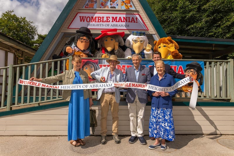 Vanessa and Andrew Pugh with Rupert Pugh and special guests Marcus and Marianne Robertson (the original inspiration for Orinoco and Alderney Wombles) and the Wombles in front of the new exhibition which opened to the public on July 26.
