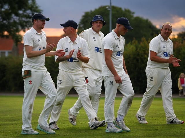 Sherburn fielders applaud after the Ebberston innings is completed.