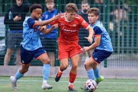 Bridlington Town, red kit, lost 2-1 at Bottesford Town. Photo by TCF Photography