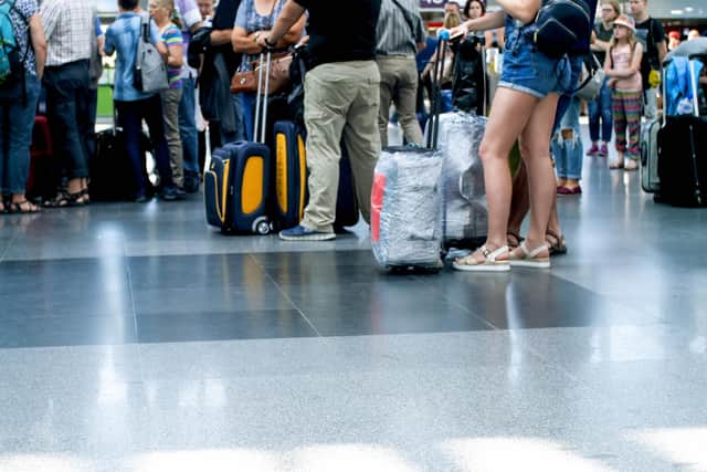 Airport queuing brings out the worst in people (Adobe)