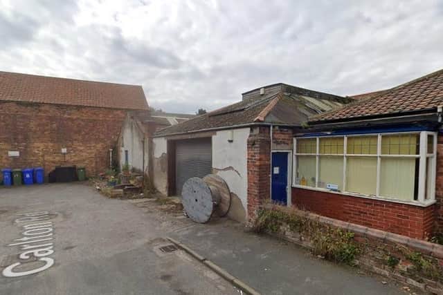 A Filey builder’s yard could be demolished for the construction of a seven-apartment property.