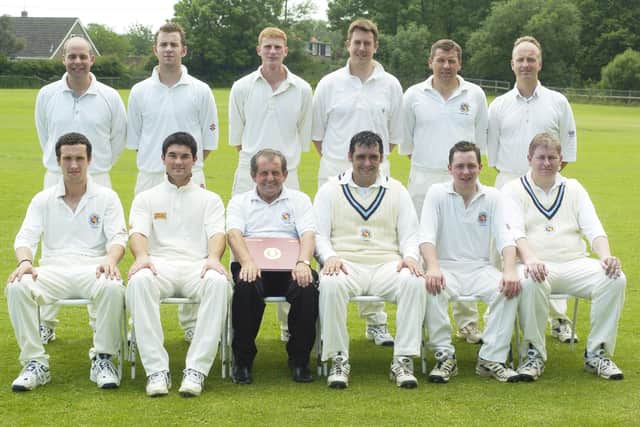 Forge Valley CC scorer George Ireland is pictured, front row third from left, in 2005.