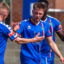 Aaron Haswell has decided to stay with Whitby Town for another season.