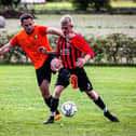 West Pier, red and black striped kit, in action against Edgehill earlier this season, claimed a 4-2 League Cup semi-final win at Seamer Sports.