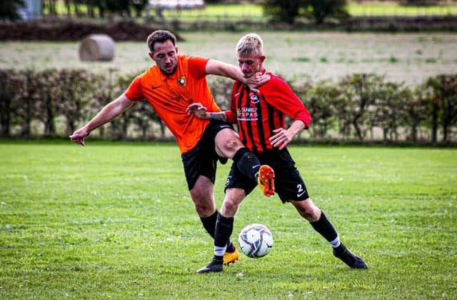 West Pier, red and black striped kit, in action against Edgehill earlier this season, claimed a 4-2 League Cup semi-final win at Seamer Sports.