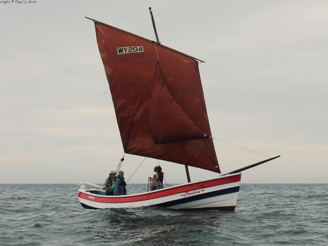 The 1949 Amble built coble Providence makes an appearance at the event.