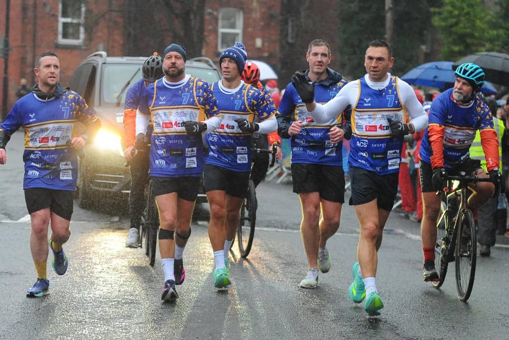 Kevin Sinfield (second right) and his team during last year's challenge