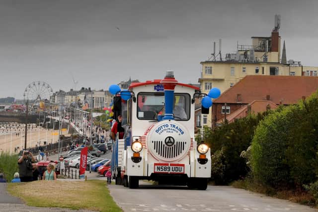 The Land Trains provide a fun way to get around town. Photo: Simon Hulme