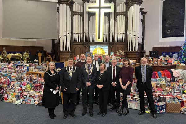 The Mayor and Mayoress with organisers and guests at Scarborough Rotary Club's annual toy and carol service.