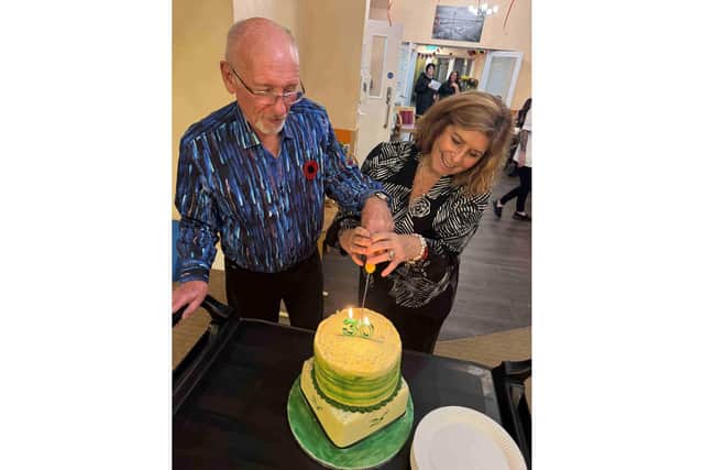 Dr Kevin and Theresa O'Sullivan cutting the 30th birthday cake