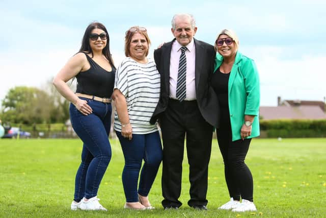 George Ireland lines up with his family at the surprise event. PHOTO BY ZACH FORSTER