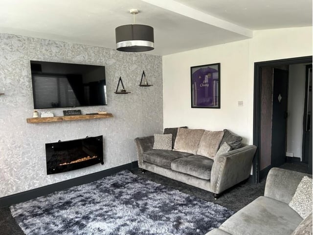 This sizable living room has doors leading out to the garden.