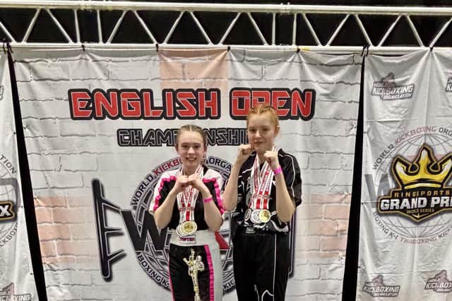Limerick Goodwin, left, and Sarah Dicks show off medals from the English Open.