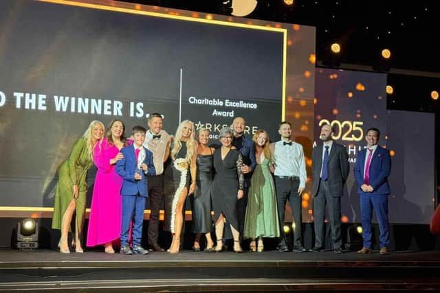 The Candlelighters team celebrate their Charitable Excellence prize at The Yorkshire Choice Awards.