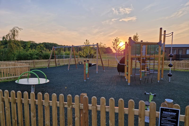 The sun sets over the play area at the end of a beautiful day
