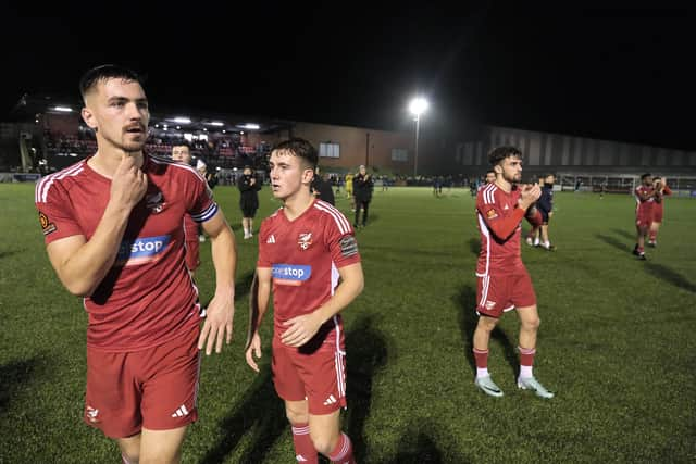 Boro players thank the fans after the final whistle.