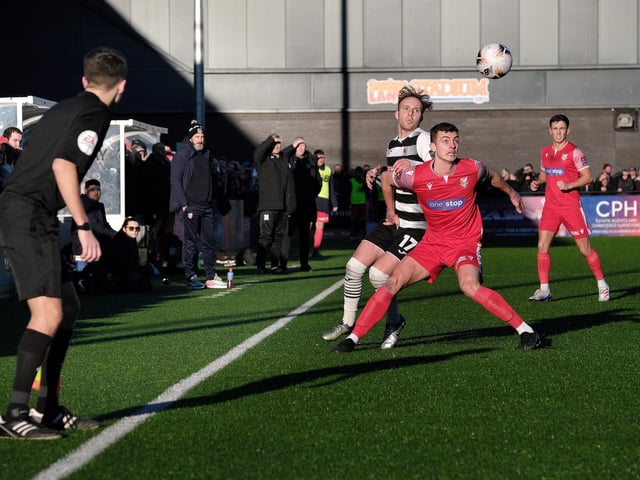Boro's man of the match Luca Colville is pressured by Darlington midfielder Jack Lambert