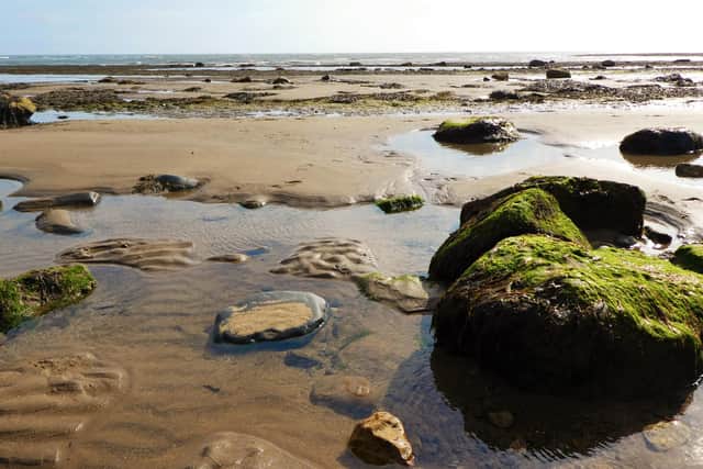 The beach at Robin Hood's Bay during low tide.