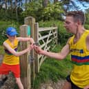 Scarborough AC's Paul Lawton to Alfie Carr at the Cleveland Way Relay.