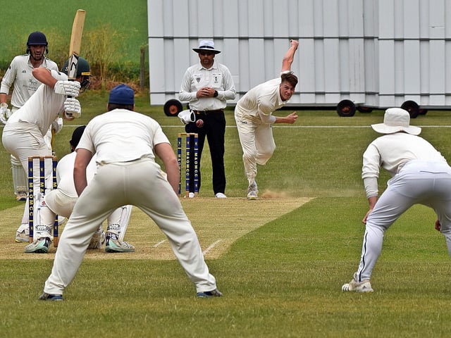 Corey Hart in bowling action for Scarborough CC at Malton.