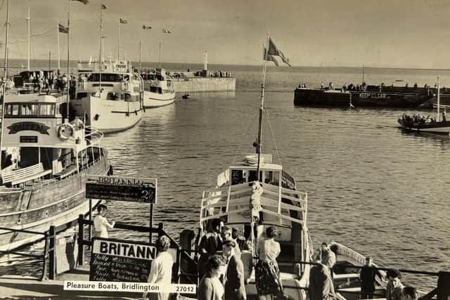 Dated to 1960 this postcard also shows the passenger boats Britannia, Bridlington Queen and Thornwick.