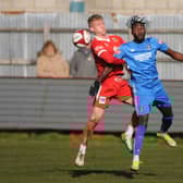 Bridlington Town's Will Sutton and Dunston's Sado Djalo during the 2-1 win for the visitors. PHOTOS BY DOM TAYLOR