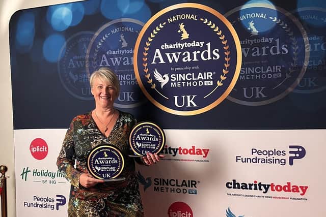 Michelle Davison-Ward, CEO and Founder of Sparks, with awards at the National Charity Today Award Ceremony.