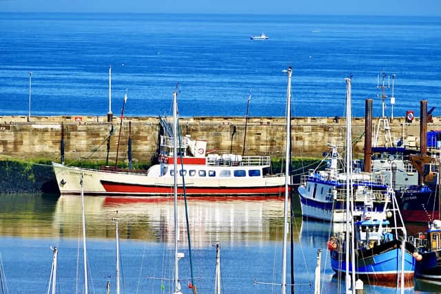 The Belle's reflection in the harbour, By Aled Jones