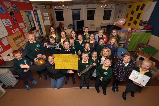 The Den leaders Elaine Sutcliffe and Anita Huby celebrate 25 years with pupils