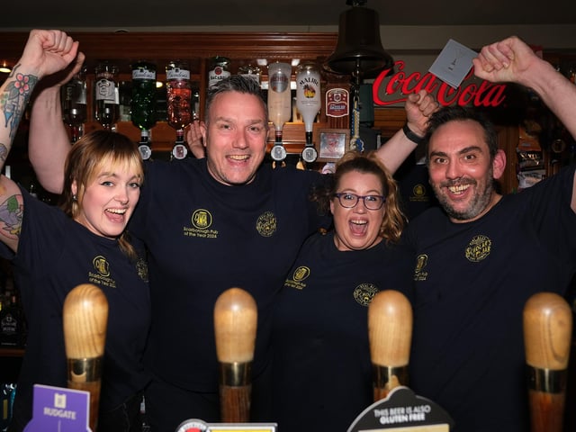 Scholar's Bar staff cheer on England
