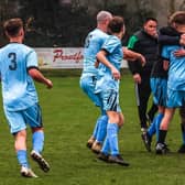 Newby celebrate during their late cup win against Scalby in the Saturday League Cup.