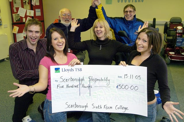 Scarborough 6th Form Students raise cash for Scarborough Shopmobility, back from left: customers George Howe and Martin Howe mid Shopmobility staff Bookings Manager Nick Butler and Projects Manager Wendy Smith. Front, students Hayley Sykes and Rachael Cooper.