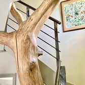 The upper section of the oak centrepiece within the cottage.