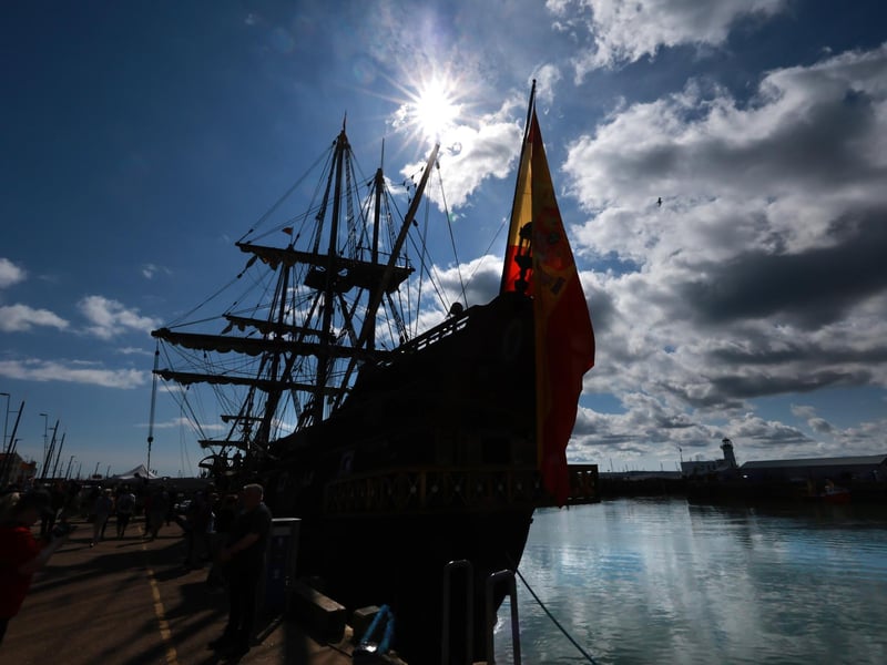 The Galeon silhouetted by the sun.