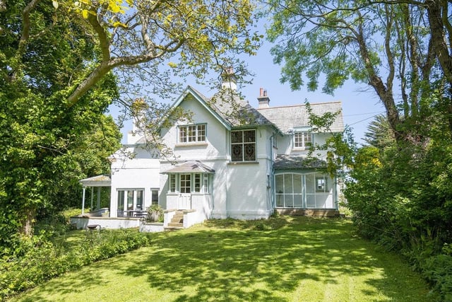 White Lodge offers a rare opportunity to buy a unique, secluded period home with vast private gardens, grounds and enchanting woodland which looks like it has come straight out of a fairytale book in a stunning coastal location.