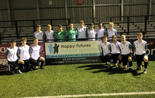 The Scarborough Athletic FC Academy Under-16s line up with their new kit from last season.